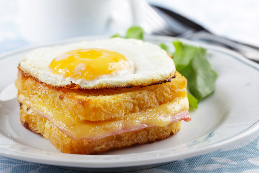 Croque madame, a French sandwich with ham, melted cheese and egg.