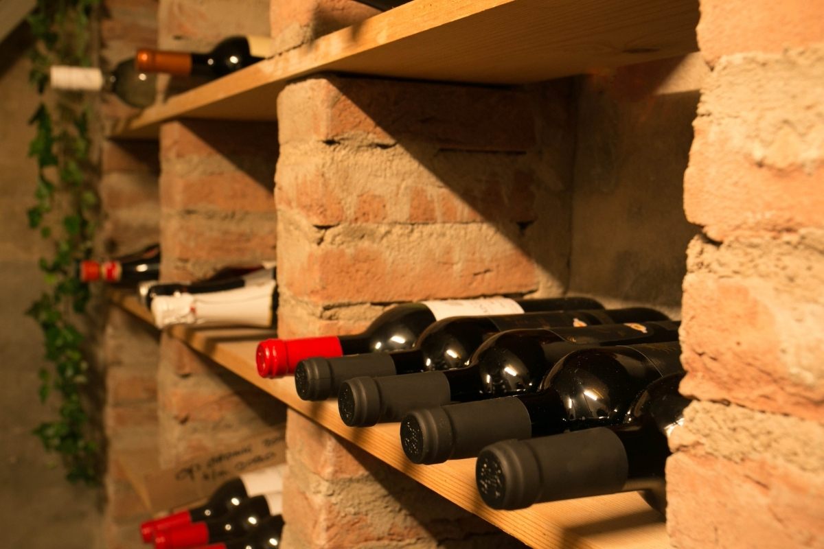 Wine cellar set up in a basement.