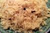 Arroz pilau hervido en leche de coco.