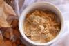 Cardo en salsa blanca con nueces y almendras.