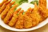 Gambas rebozadas con coco hechas en el horno.