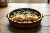 Bacalao al estilo de Alcántara en cazuela de barro.